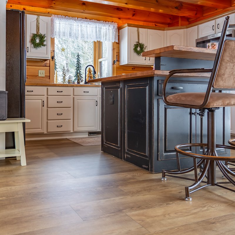 Living room in a New Providence, PA cabin with a LVP flooring
