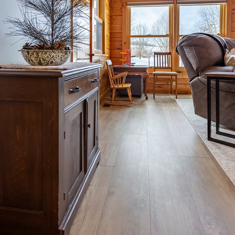Living room in a New Providence, PA cabin with LVP flooring